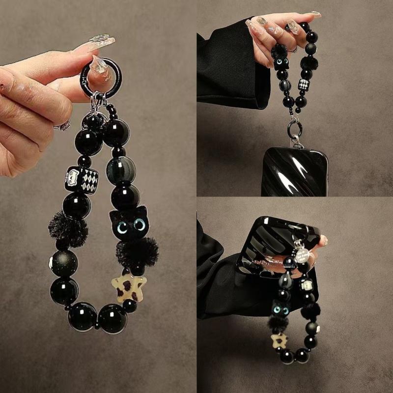 Luxury Black Fluffy Cat Phone  - Luxury Bags And Accessories recension och pris